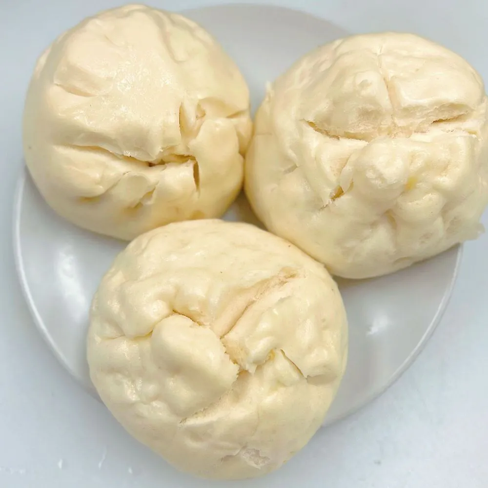 Soft steamed bun with savory chicken filling at D&D Dim Sum Bakery, a Chinese Restaurant in Elk Grove