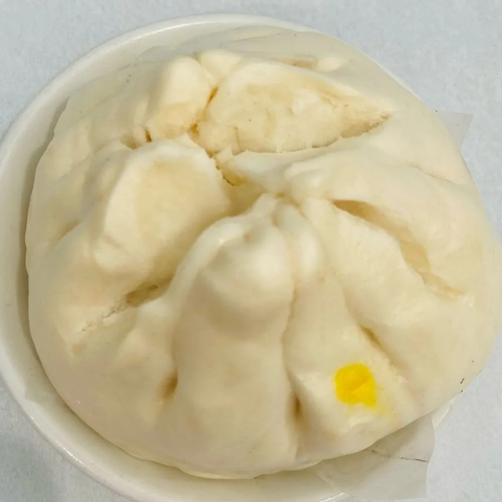 Giant steamed bun with pork and green onion filling at D&D Dim Sum Bakery, a Chinese Restaurant in Elk Grove