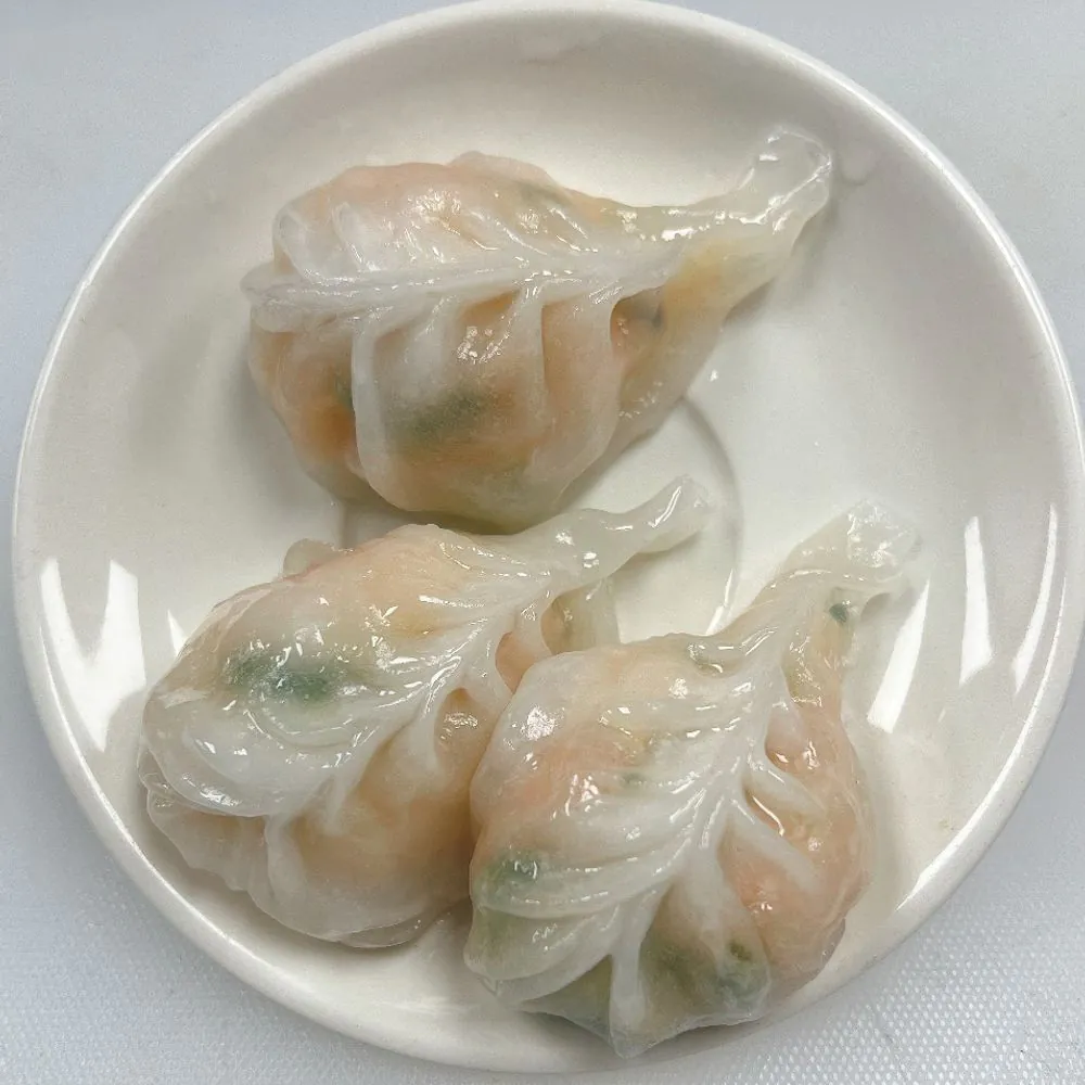 Transparent dumplings with shrimp and cilantro at D&D Dim Sum Bakery, a Chinese Restaurant in Elk Grove