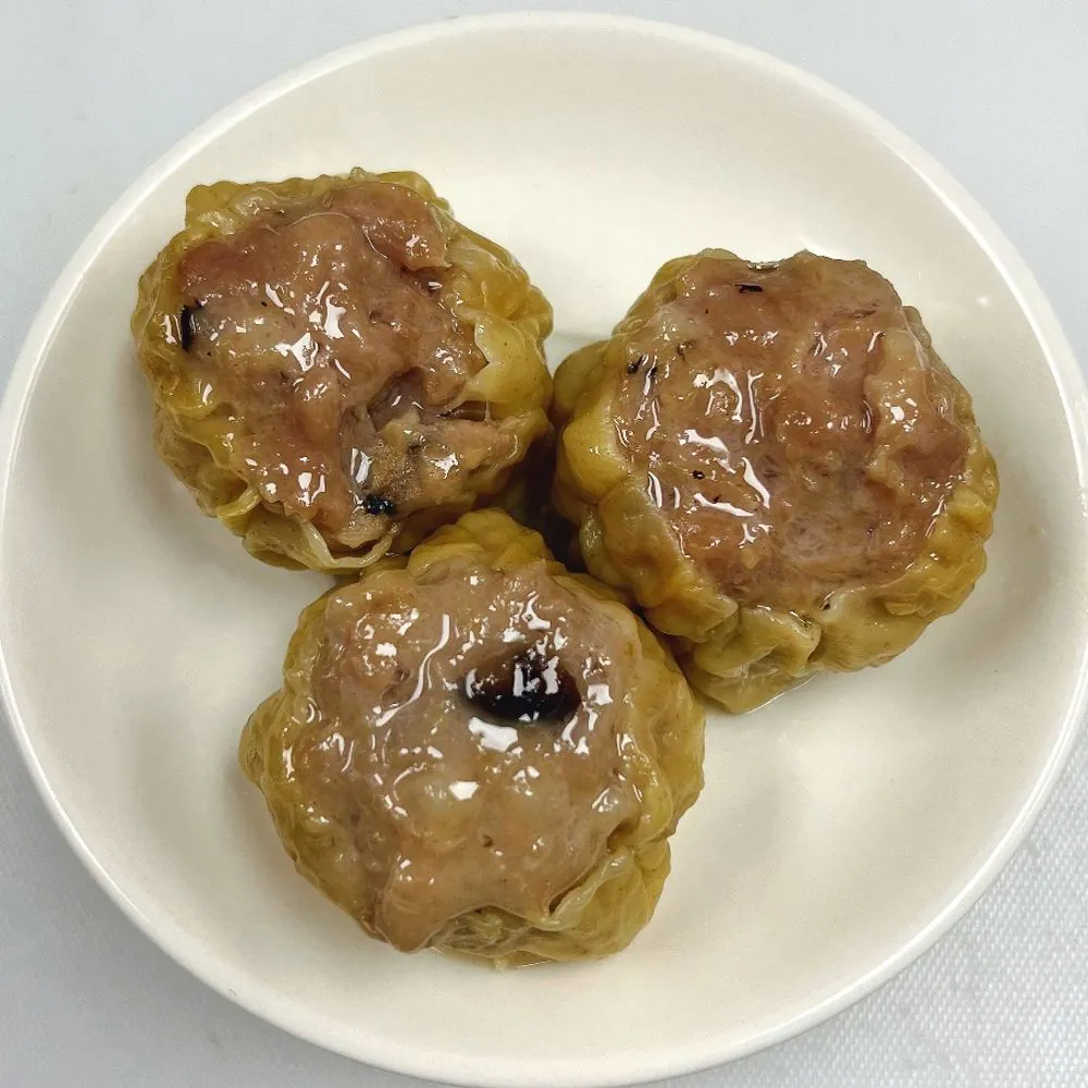 Steamed pork dumplings with corn and mushrooms at D&D Dim Sum Bakery, a Chinese Restaurant in Elk Grove