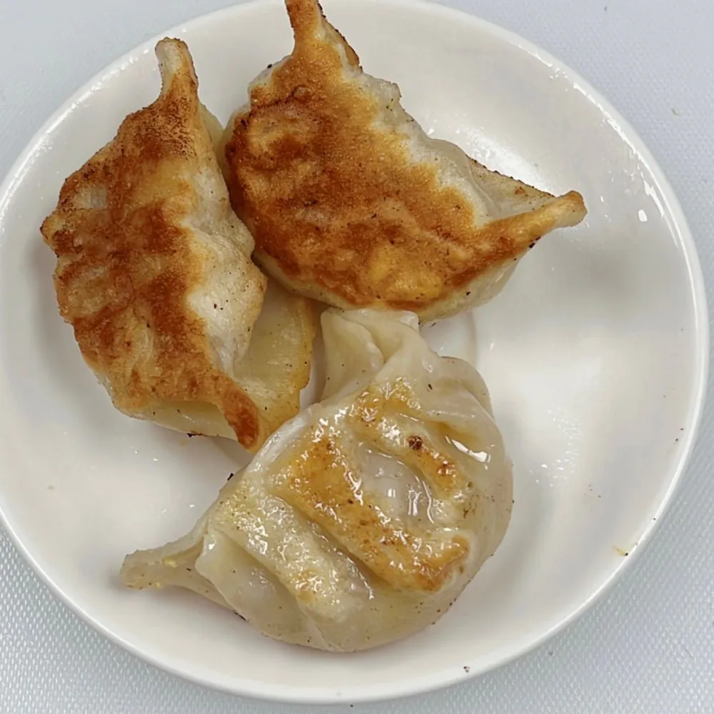 Pan-fried dumplings with pork and vegetable filling at D&D Dim Sum Bakery, a Chinese Restaurant in Elk Grove
