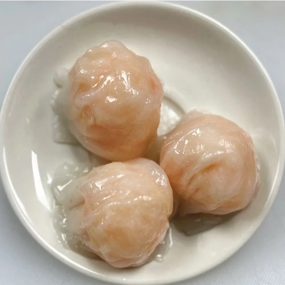 D&D-Dim-Sum-Bakery-Chinese-Restaurant-Shrimp-Dumplings-Elk-Grove Transparent dumplings with whole shrimp filling at D&D Dim Sum Bakery, a Chinese Restaurant in Elk Grove